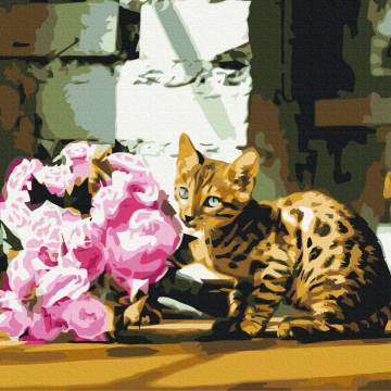 Pisică cu pete între flori