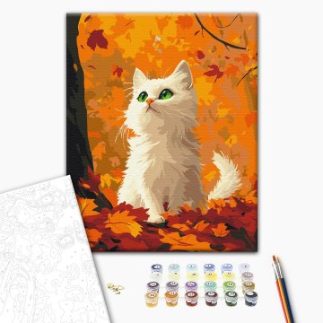 Kitty in fallen leaves