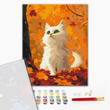 Kitty in fallen leaves