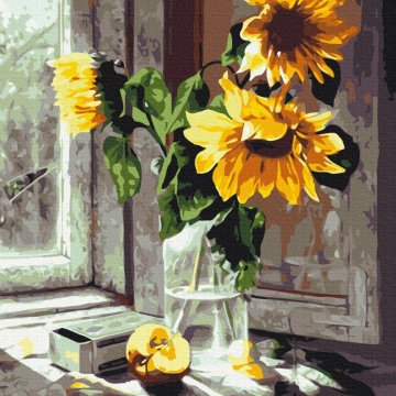 Bouquet of sunflowers in the window